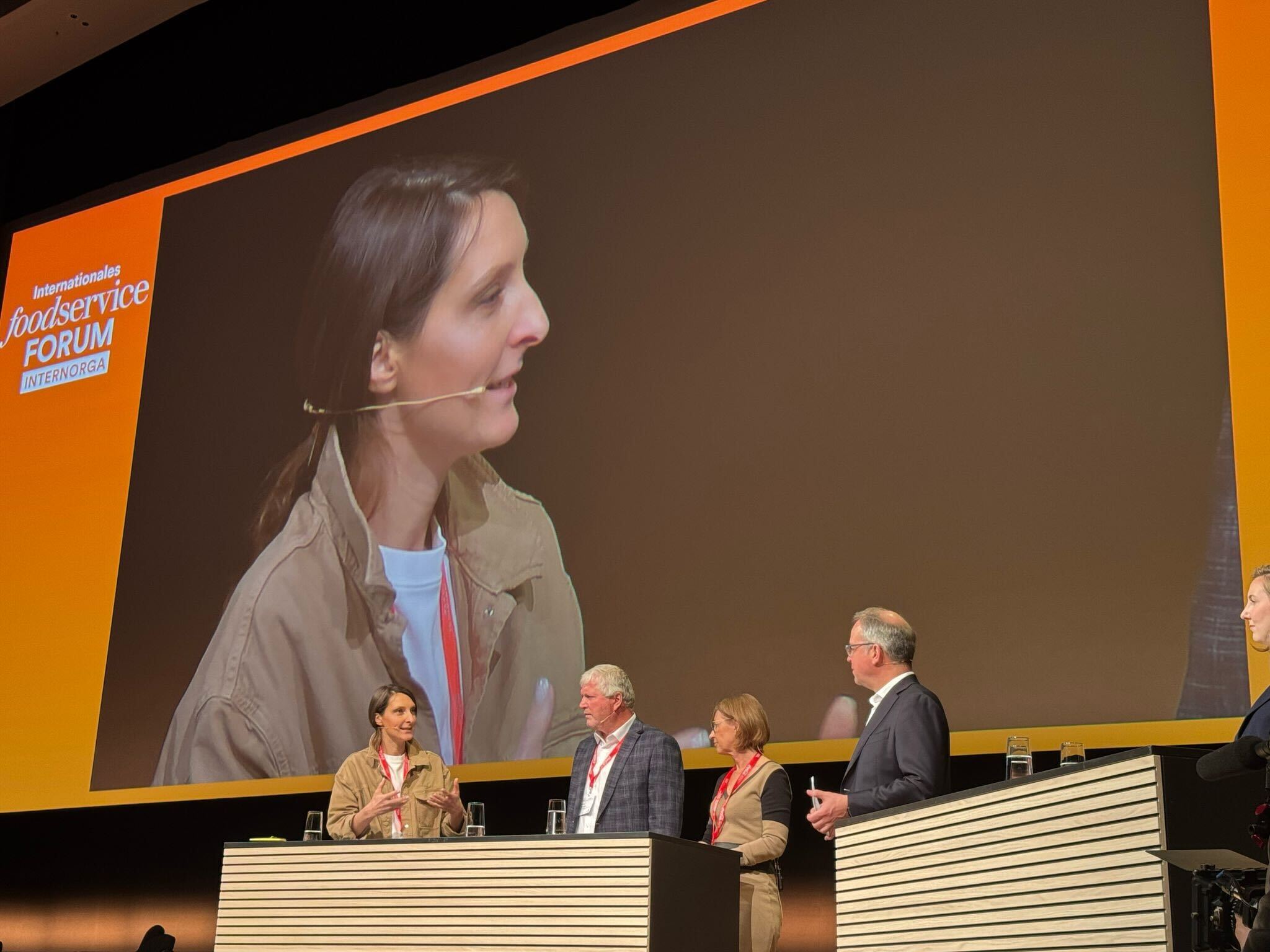 Oksana speaking at panel